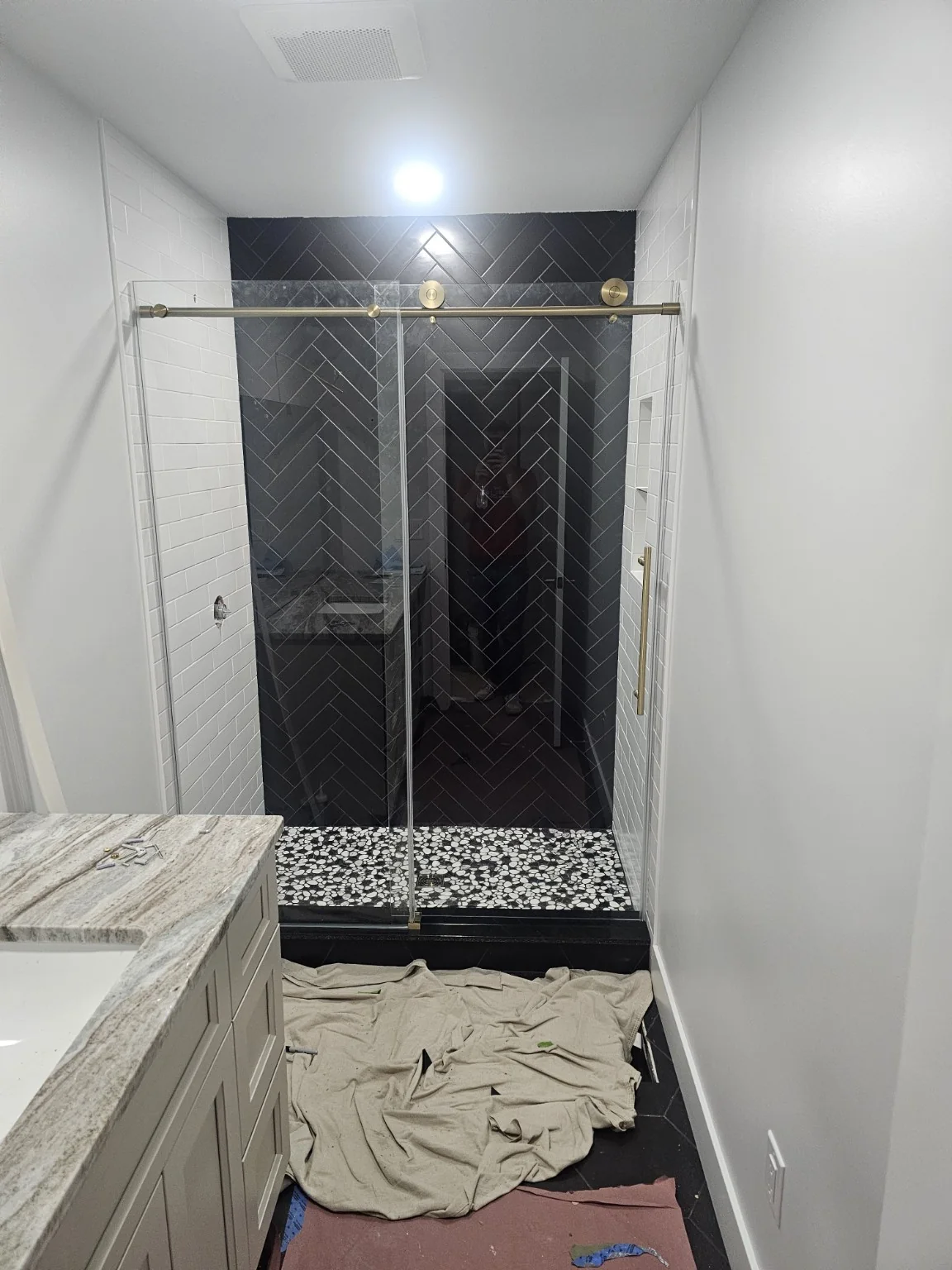 Black and white tile shower remodel